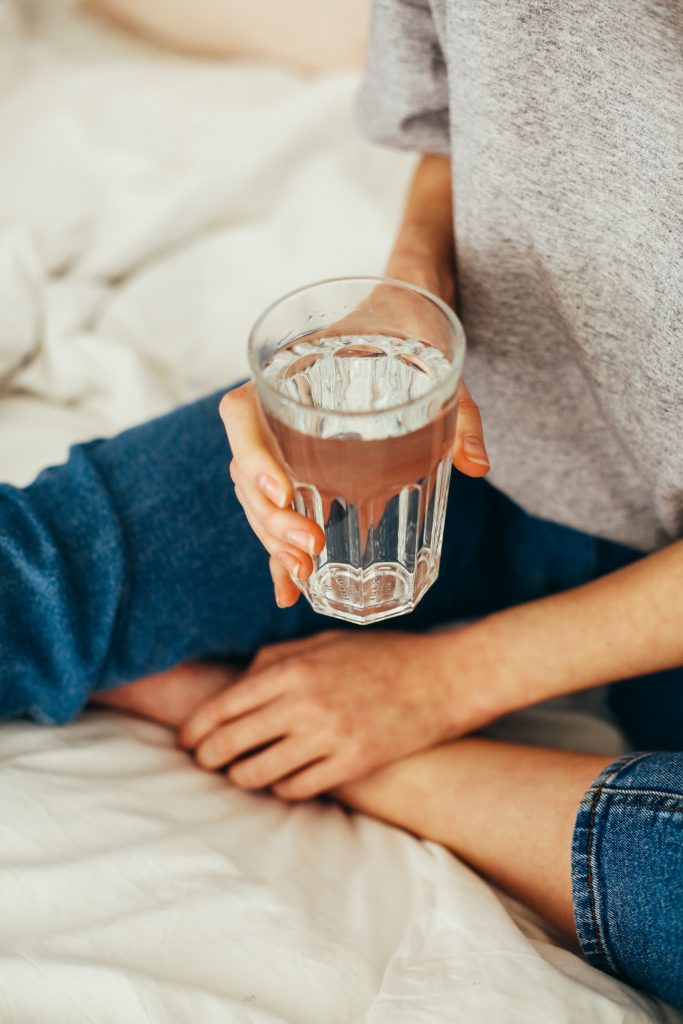 woman holding glass of water, hydration, water, Best Hydrating Foods